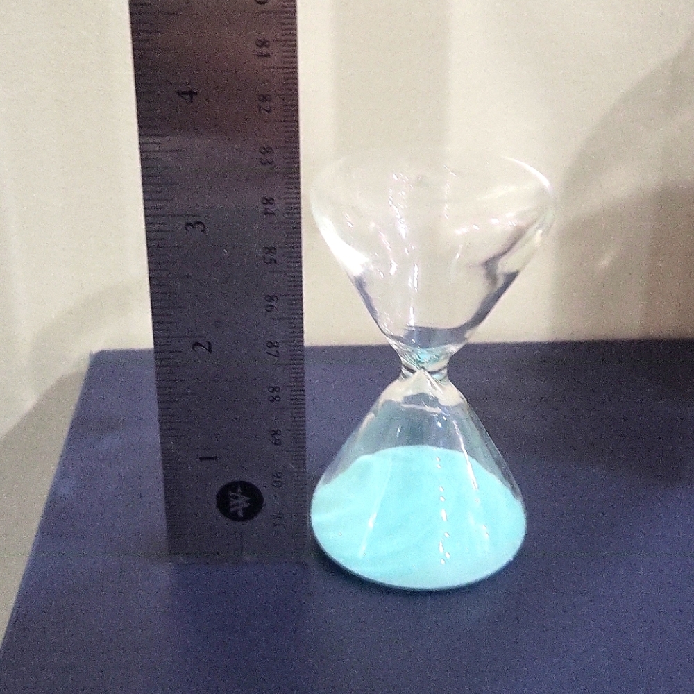 Mini glass hourglass with teal sand